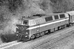 DSB MZ 1409 (type I) photographed in Fredericia - heading for Vejle.15. January 1978.  The MZ class (type I and II) was purchased from 1967 to 1970 in a number of 26. Only a few of these engines remain in service by DSB - most are now sold to other companies. Built by NOHAB and Frichs. Dieselelectric. Co'Co'. 2270 kW - 3300 hp. Max speed 143 km/h - 89 mph. Length 20 800 mm. Weight 116,5 metric tonnes. MZ 1409 was put in service in 1969. Withdrawn from service in 2001. In 2005 sold to a compagny in the United States.